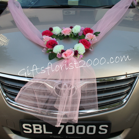 Wedding limousines with flowers