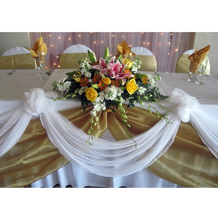 Wide selection of wedding reception flower arrangements create a beautiful